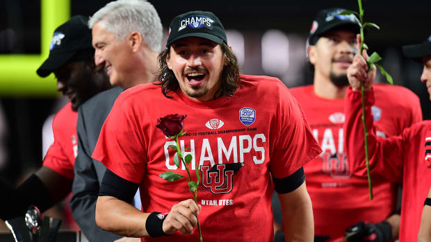 Utah Utes quarterback Cameron Rising (7) celebrates the victory against the Oregon Ducks in the 2021 Pac-12 Championship Game at Allegiant Stadium.